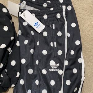 Adidas track pants in a size L. Fun print. NWT
